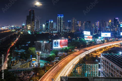 Business Building Bangkok city area at night life with transport
