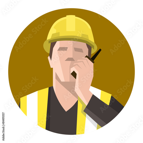 Construction worker talking on the radio