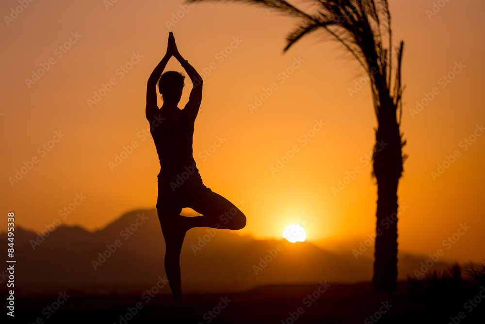 Yoga Tree Pose in tropical location