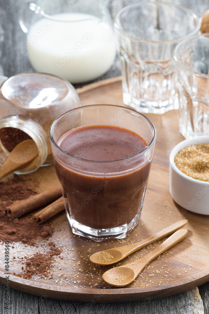 cocoa in a glass on a wooden tray cocoa in a glass on a wooden tray
