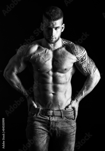 Muscular man - half-length, black and white photo