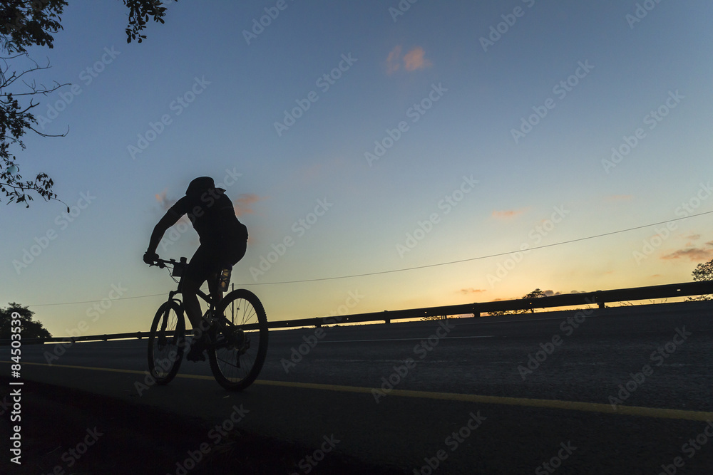 Fototapeta premium Cycling Dawn Road