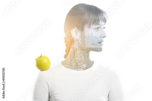 Double exposure of a beautiful girl and night cityscape of New York.