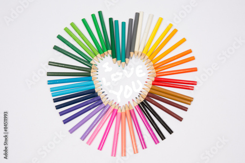Colored pencils frame heart shaped