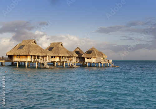 Typical Polynesian landscape -small houses on water.