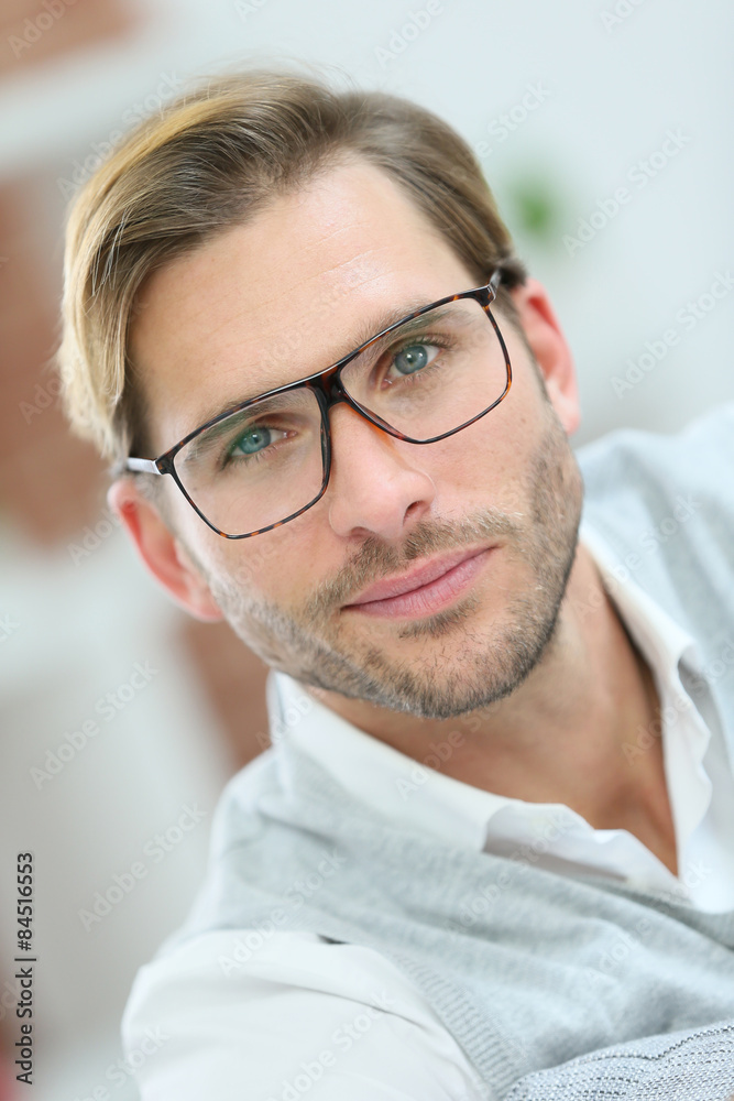 Portrait of handsome man with eyeglasses on