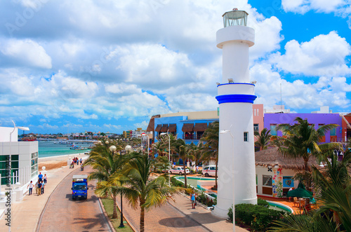 Beautiful quay with white lighthouse. Cozumel, Mexico. photo