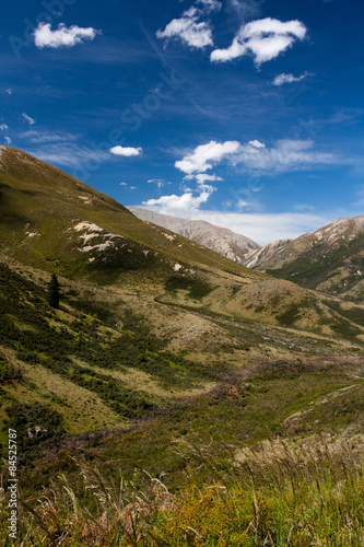 Picturesque mountain valley in summer, Korowai/Torlesse Tussocklands Park, New Zealand.