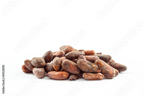 Cacao beans on a white background