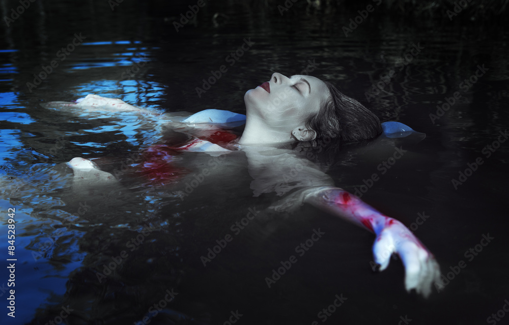 Beautiful drowned woman in bloody dress lying in the water Stock Photo Adobe Stock