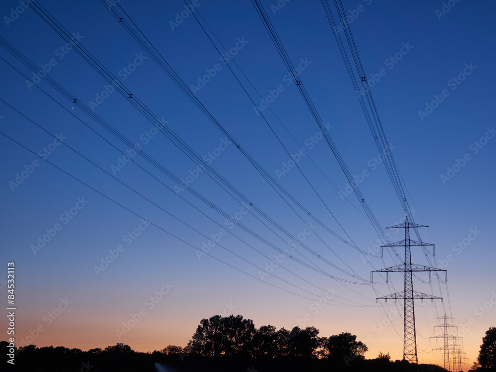 Power poles at dusk