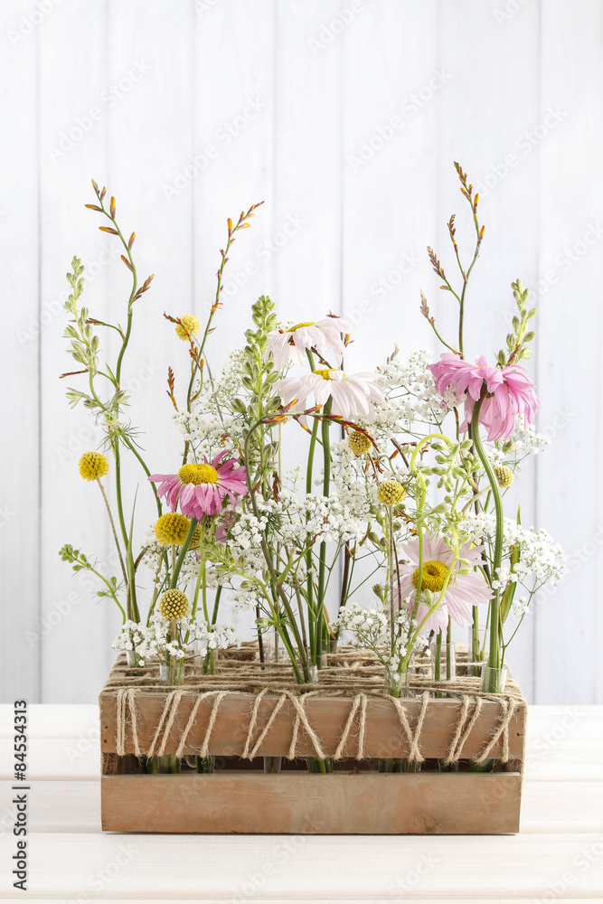 Fototapeta premium Floral table arrangement with gerbera flowers