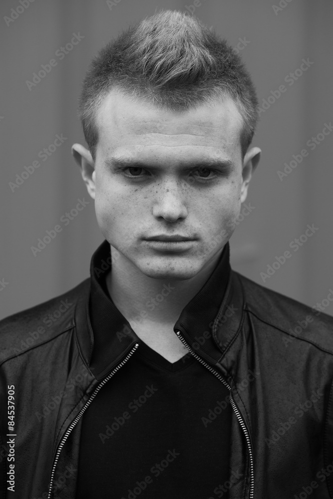 Obraz premium Stylish bully concept. Portrait of brutal young man