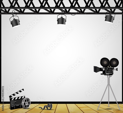 A vintage theater spotlight on a white background on the stage