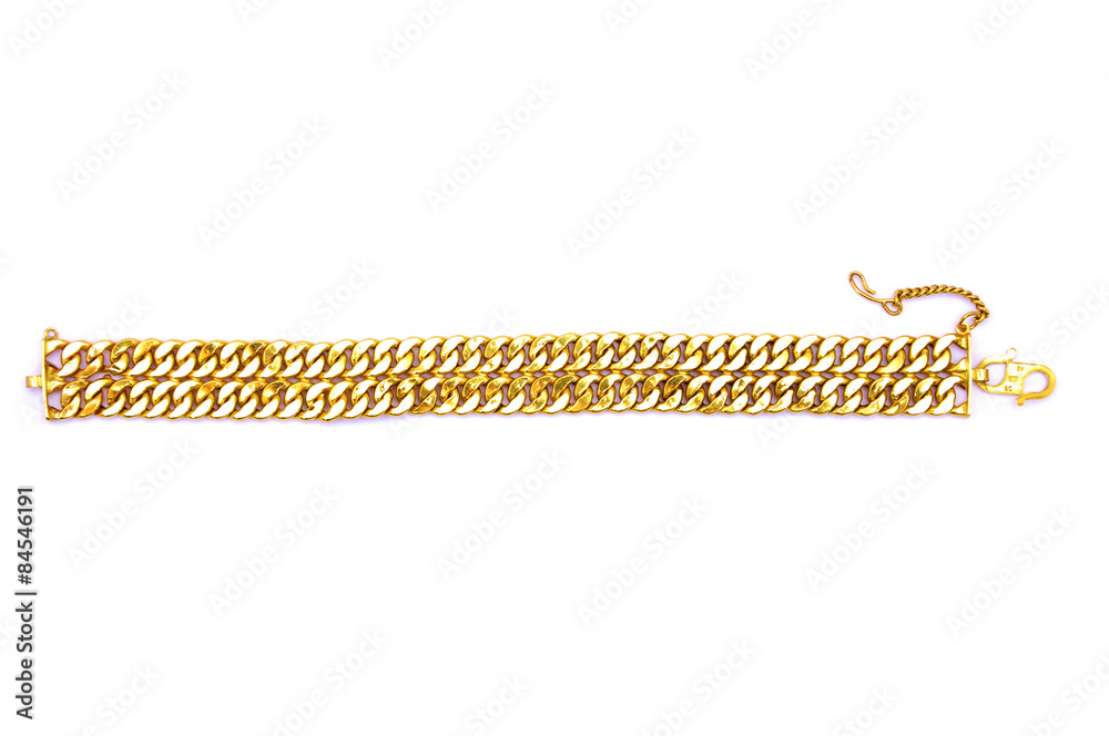 Fototapeta premium Gold bracelet over white background