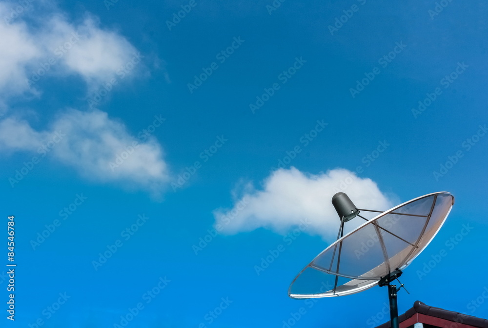 satellite dish with clouds in the sky