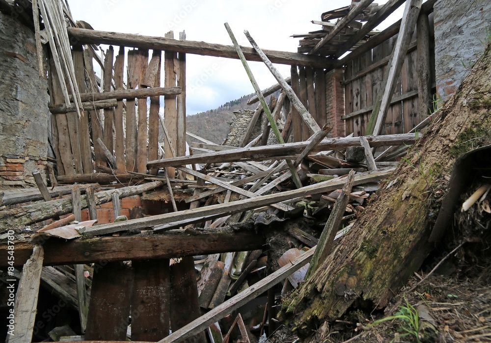 House in ruins and abandoned with the roof destroyed in the moun