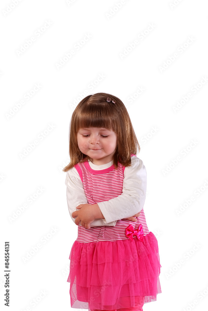 Cute little girl in a pink dress