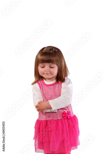 Cute little girl in a pink dress