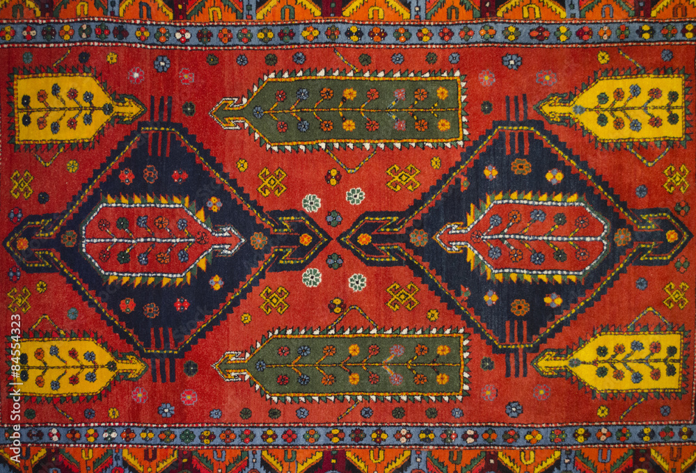 The middle red woolen carpet with geometric pattern