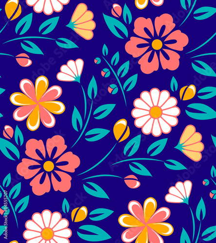 Seamless spring flower pattern on blue background.