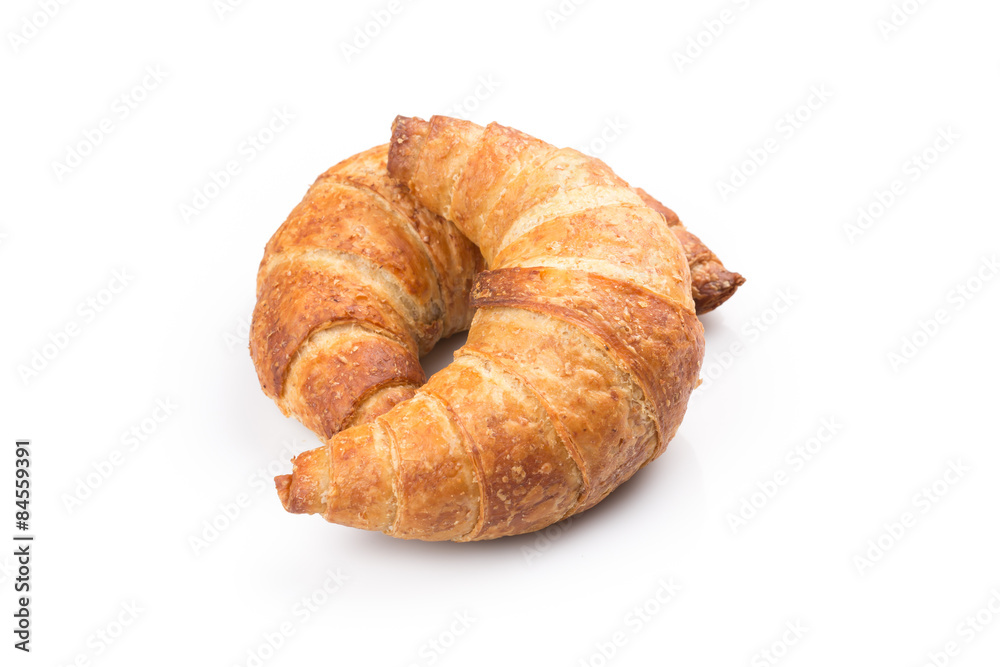 Croissant over white background