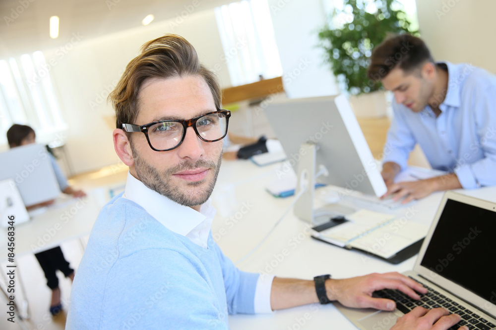 Businessman with eyeglasses working in office Businessman with eyeglasses working in office