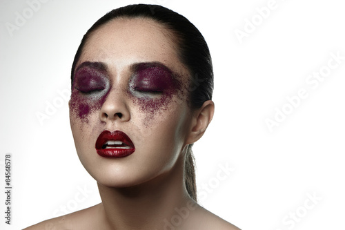 Fashion female Model with purple Makeup