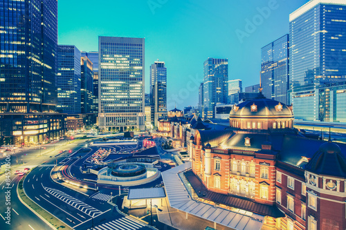 Tokyo railway station and Tokyo highrise building at twilight time
