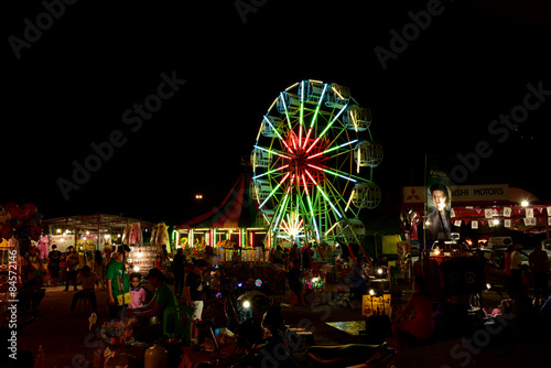 Amusement in night Where people are having fun and happiness 