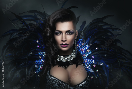diva in accessory of diamonds and black feathers photo