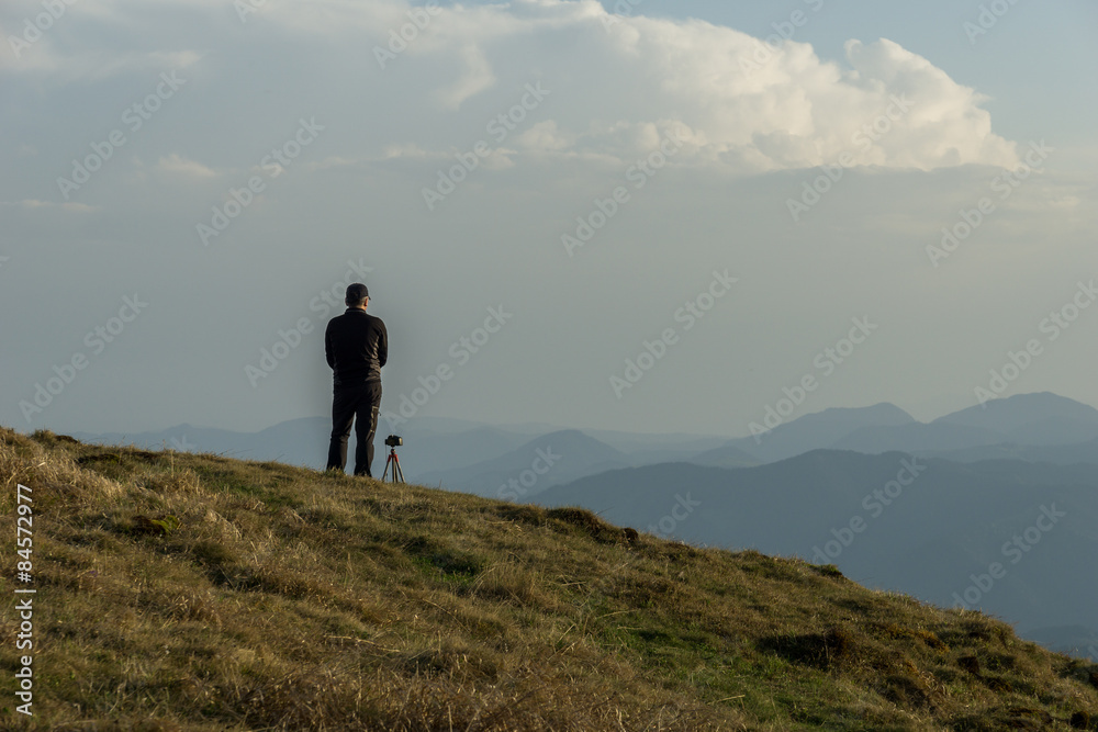 landscape photographer on top of the mountain