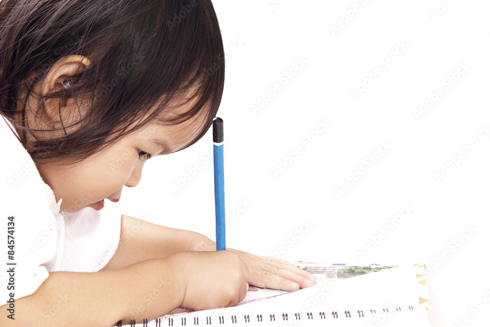 Asian Baby, Toddler, Writing on Notebook Isolated on White Background Asian Baby, Toddler, Writing on Notebook Isolated on White Background
