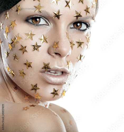 Fototapeta Naklejka Na Ścianę i Meble -  Close up woman fase shot with stars on face