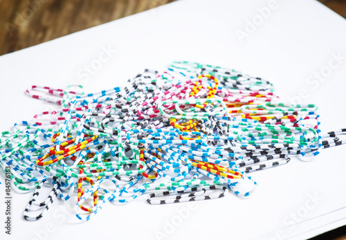 Office colored paper clips, selective focus