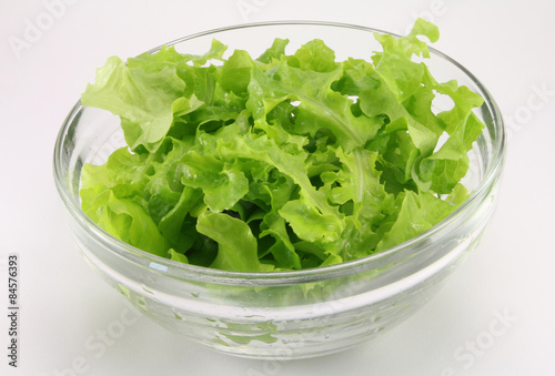Lettuce in a glass salad bowl transparent