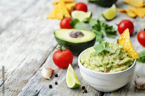 guacamole with corn chips photo