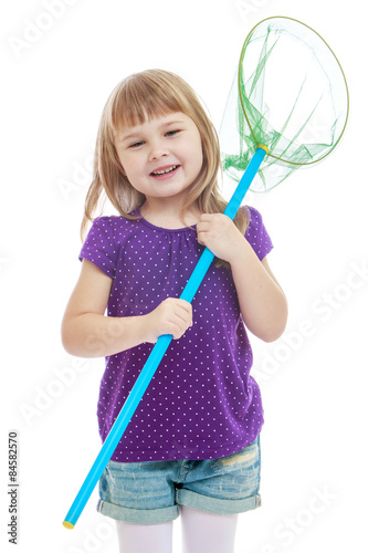 Beautiful blonde little girl holding a butterfly net for catchin photo