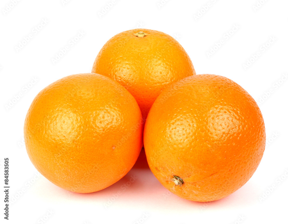 Three ripe oranges on a white background Three ripe oranges on a white background