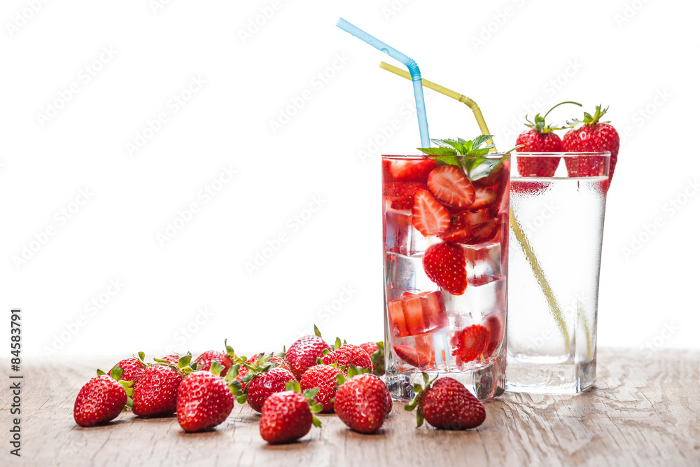 two glasses of strawberry cocktail and berries two glasses of strawberry cocktail and berries