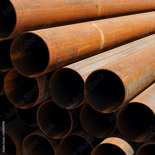 stack of rusty pipes