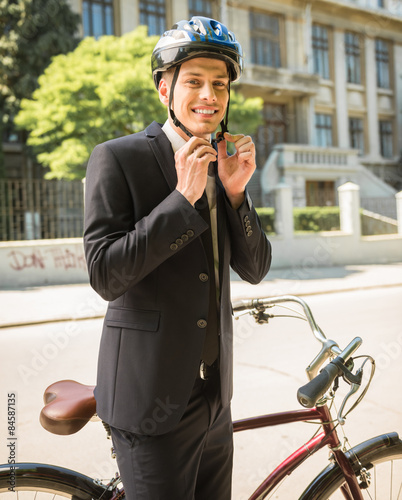 Businessman with bicycle