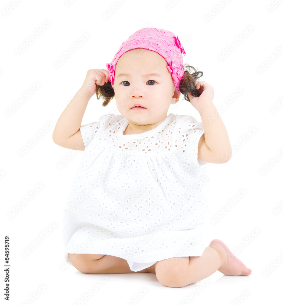 cute asian baby sitting on the floor. cute asian baby sitting on the floor.