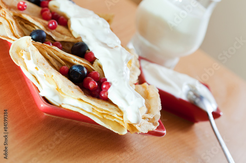 sweet pancakes with  berries photo