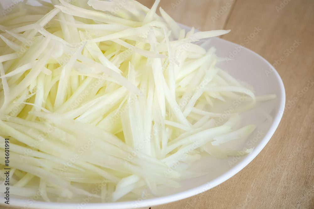 Fresh sliced papaya for Somtum thai, Closeup Thai papaya salad Fresh sliced papaya for Somtum thai, Closeup Thai papaya salad