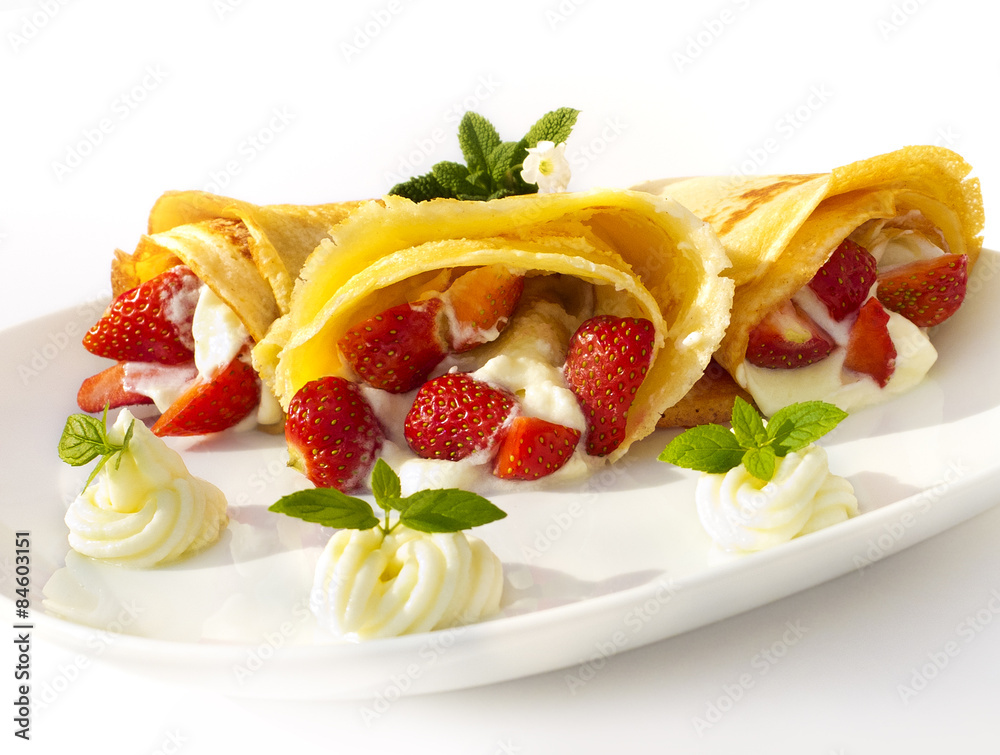 Cakes with strawberry, whipped cream, jelly and mint Cakes with strawberry, whipped cream, jelly and mint