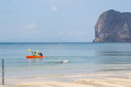 two man kayaking in the sea of Pakmeng beach, Trang, Thailand