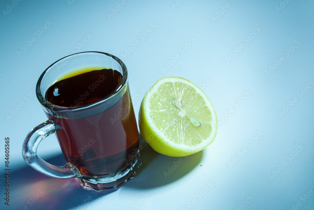 Slice of lemon and Glass of Black tea 