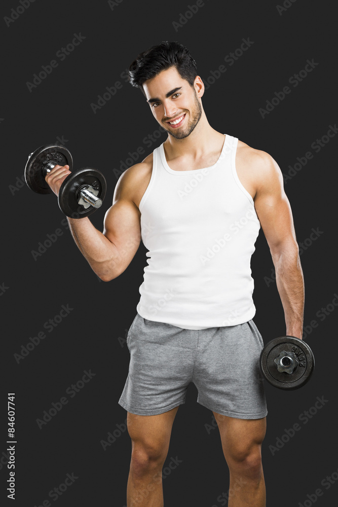 Athletic man lifting weights Athletic man lifting weights