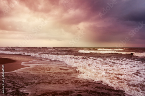 Beautiful sea landscape. The waves breaking on a  beach.